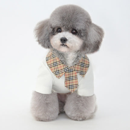 Small dog wearing black and white cotton polo shirt – breathable summer t-shirt by Petpexi for stylish pups in hot weather

