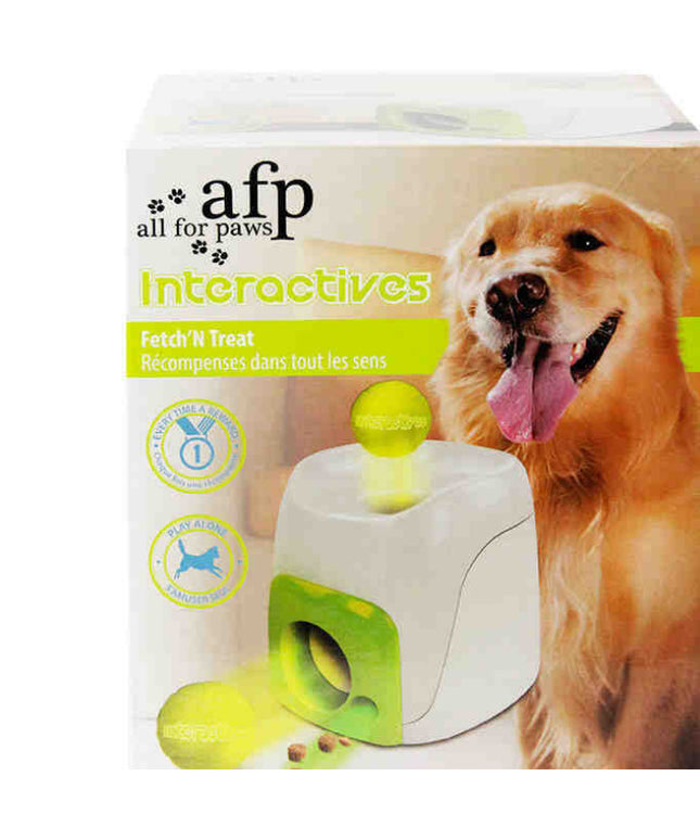 Dog playing with PetPexi Tennis Food Reward Machine, a safe ABS plastic interactive toy