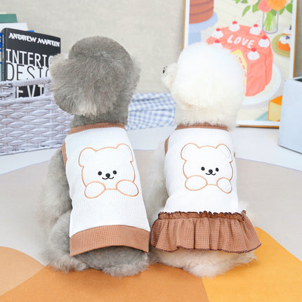 Small dog wearing cute spring and summer cotton outfit from Petpexi – available in vest, skirt, and T-shirt styles with fast USA shipping

